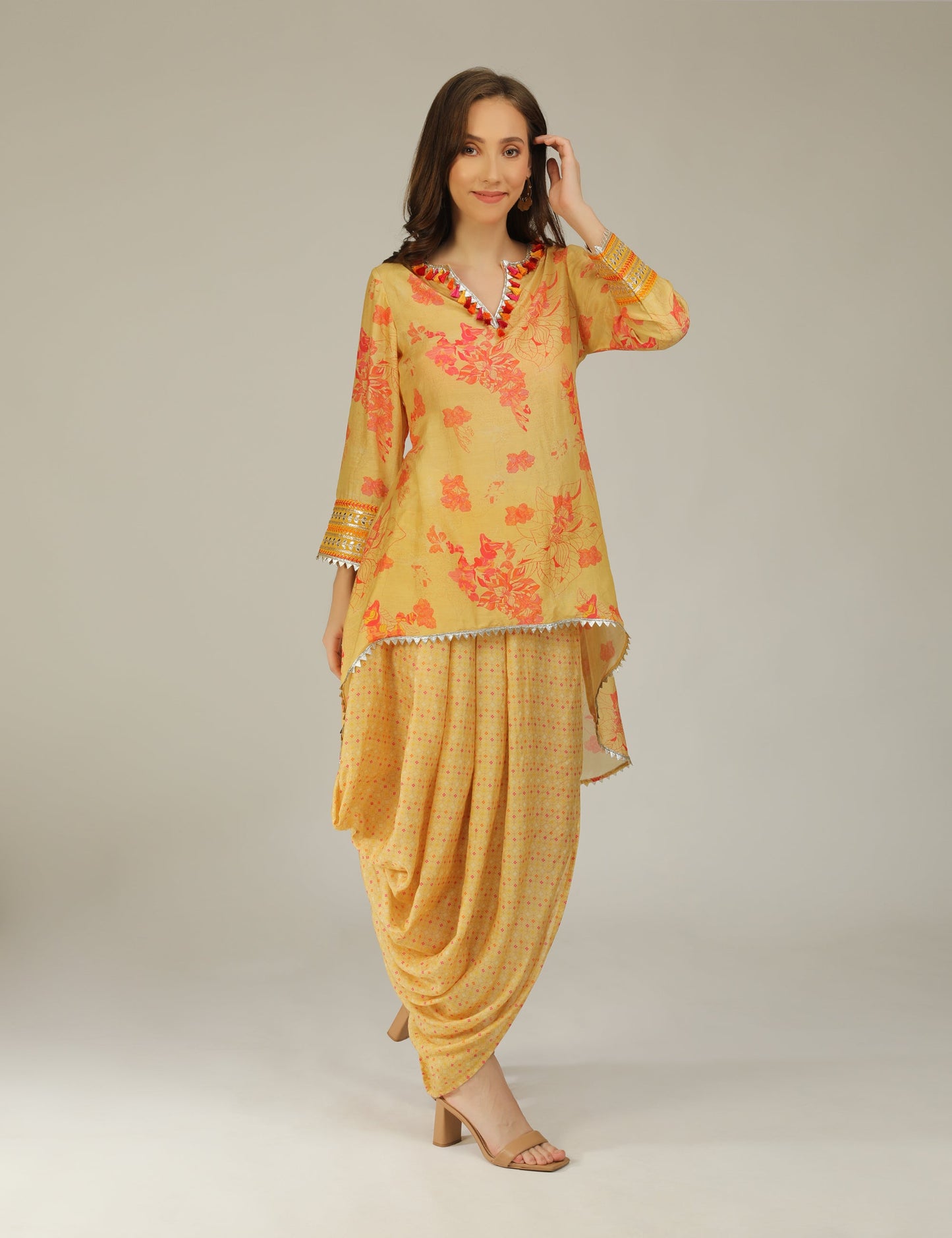Phooljhadi yellow high low hem tunic with drape skirt