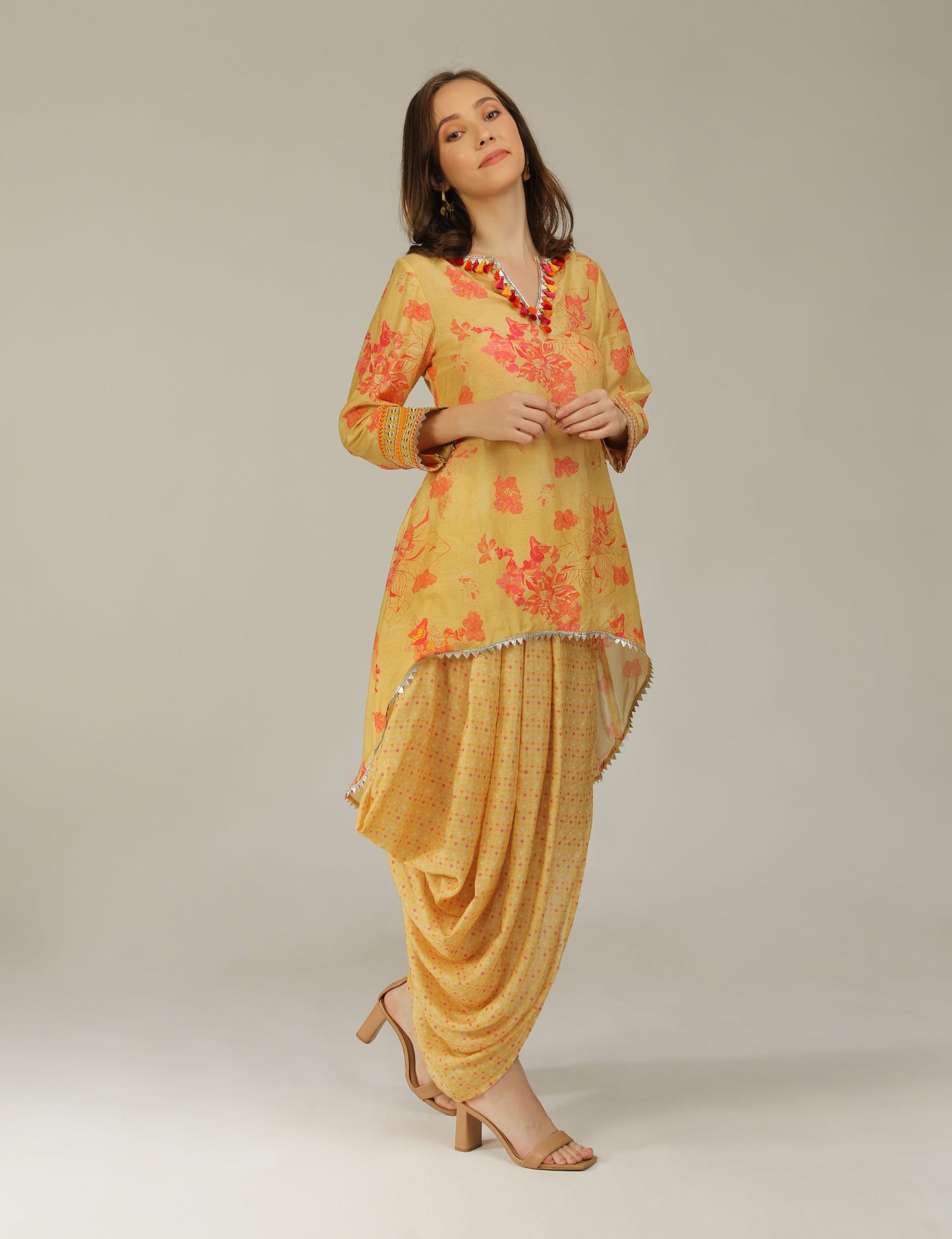 Phooljhadi yellow high low hem tunic with drape skirt