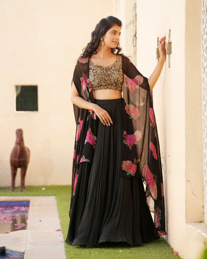 Black lehenga with sequins blouse and printed cape